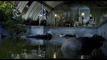 Scene from the film CATARACT by Manjari Chandrashekar. Bodies floatingin the pool. Johnny Fleming and Stephen Schreiber. Shot by Alex Boutellier